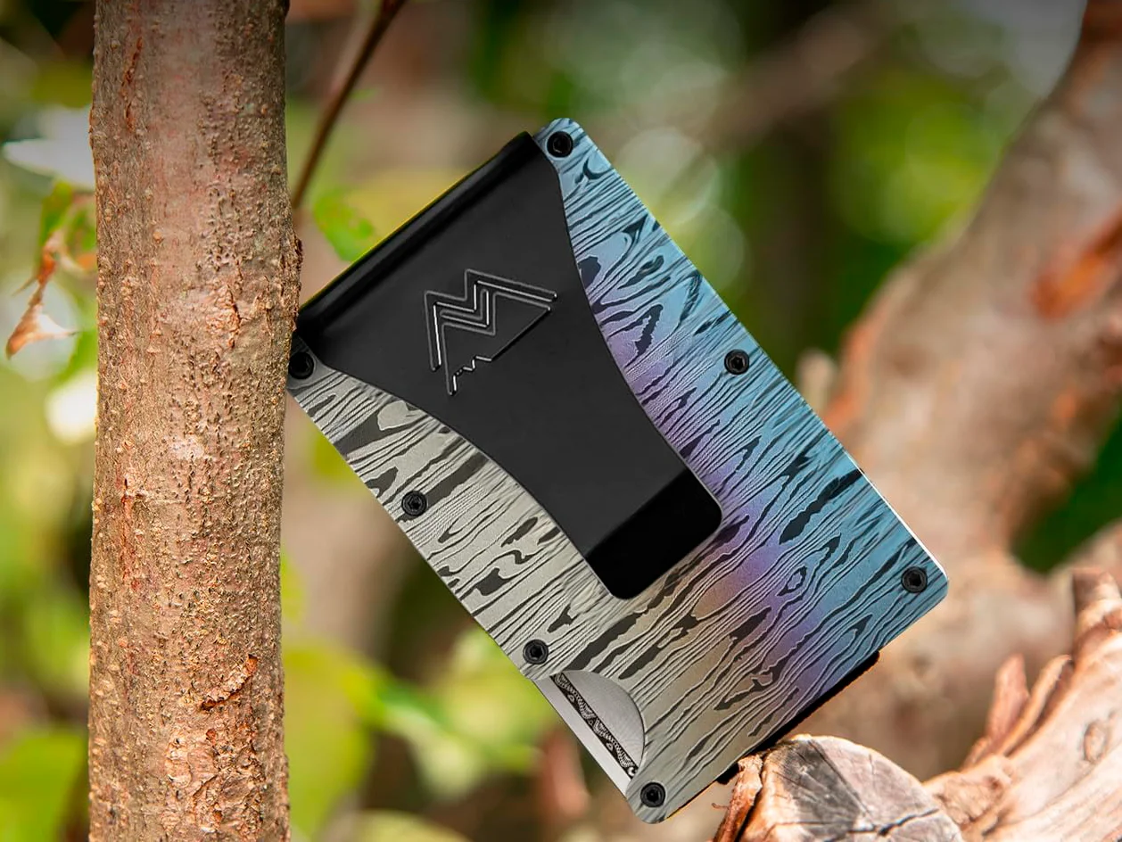 Mountain Voyage wallet in outdoor mountain setting